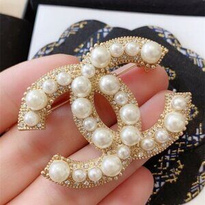 Chanel gold brooch